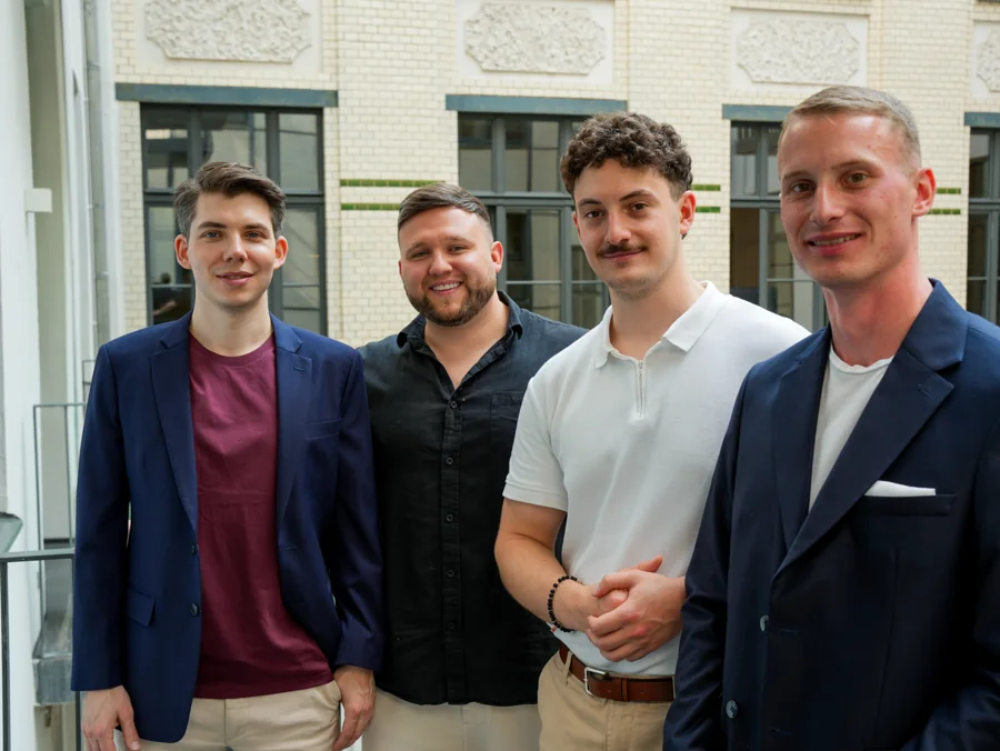 Four Web3 Factory team members together outside in Berlin